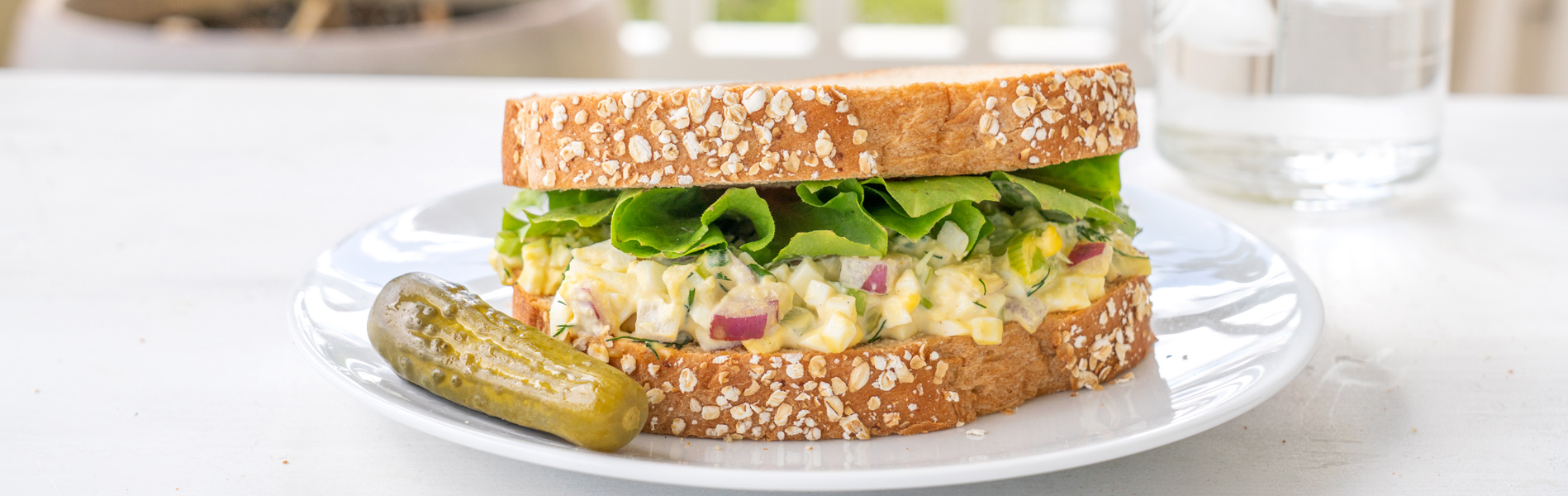 Egg Salad Sandwich with hard boiled eggs, red onion, celery, pickles, dill, mayo and Dijon 